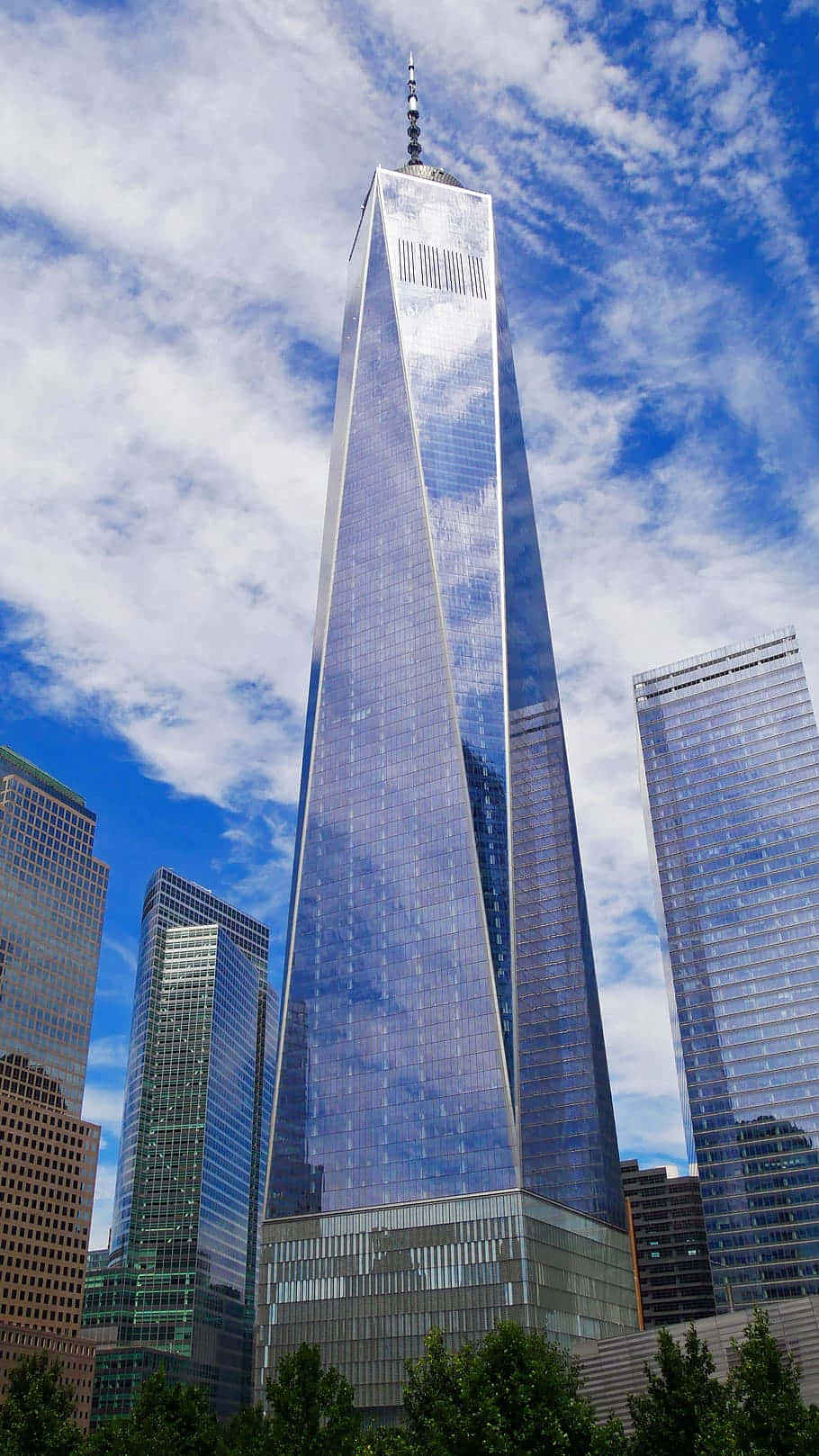 Freedom Tower With Blue Cloudy Sky In New York City Wallpaper