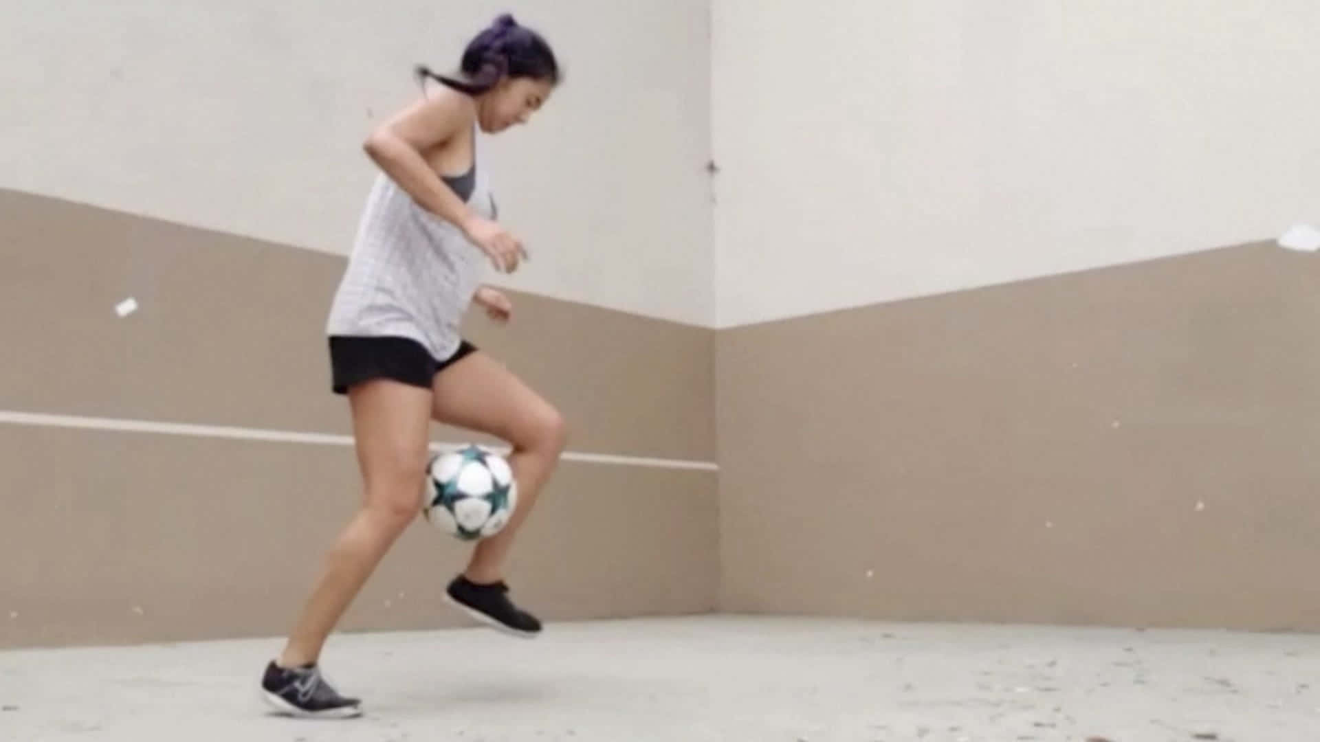 Freestyle Soccer Trick Performance Wallpaper