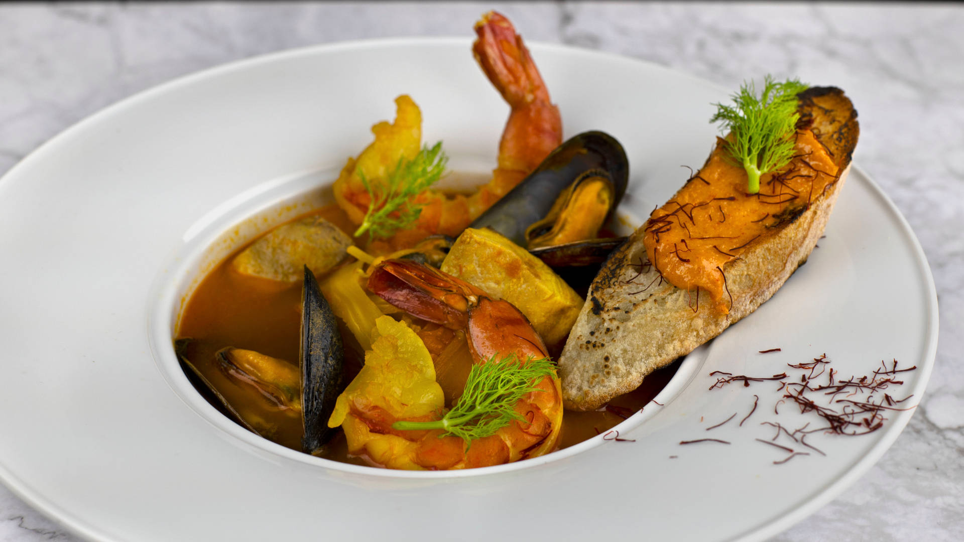 Exquisite French Bouillabaisse in Fine Dining Setting Wallpaper