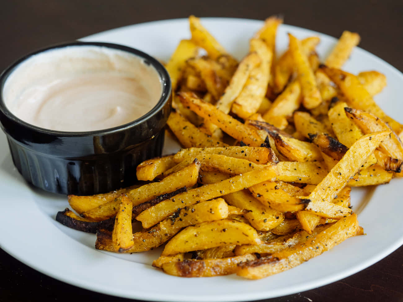Enjoy a perfectly-cooked plate of golden French fries!