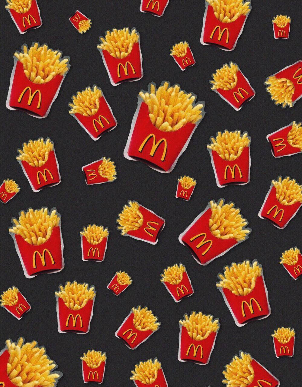 A Mouth-watering Pattern of Golden-Crisp French Fries Wallpaper