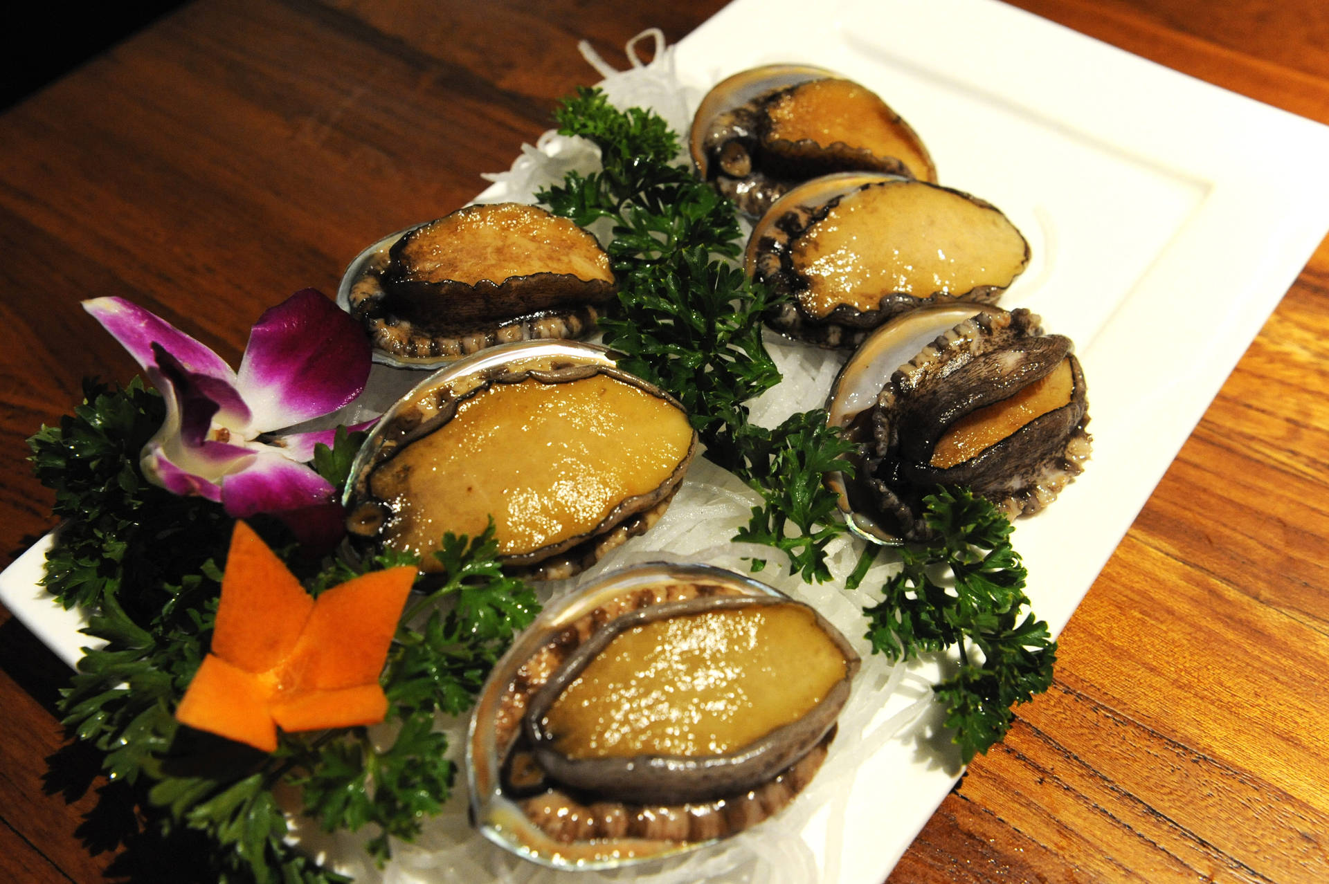 Dishes of Fresh Abalone Prepared in Gourmet Style Wallpaper