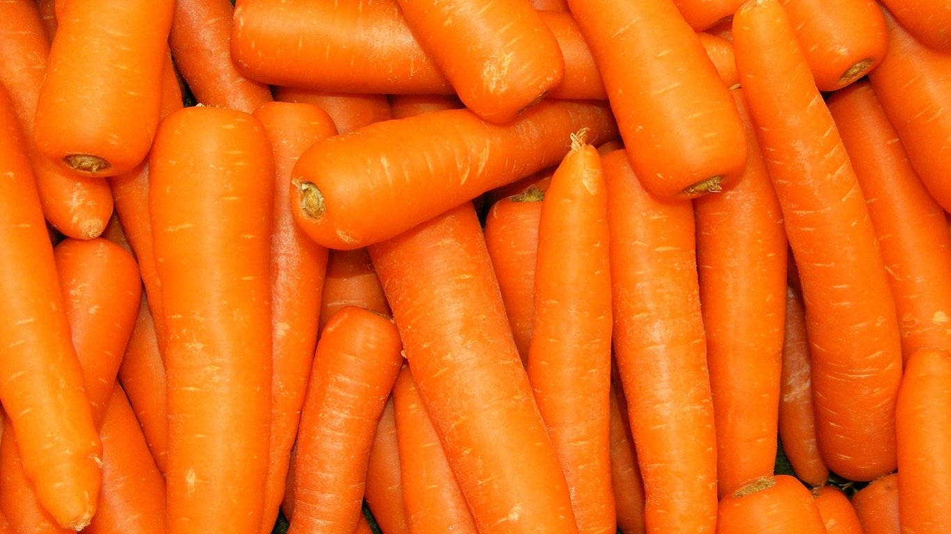 Frescasy Limpias Zanahorias Naranjas De Raíz Vegetal. Fondo de pantalla