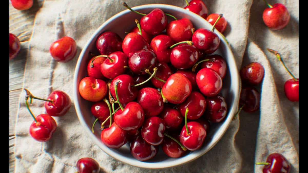 Fresh And Delicious Red Cherries Wallpaper