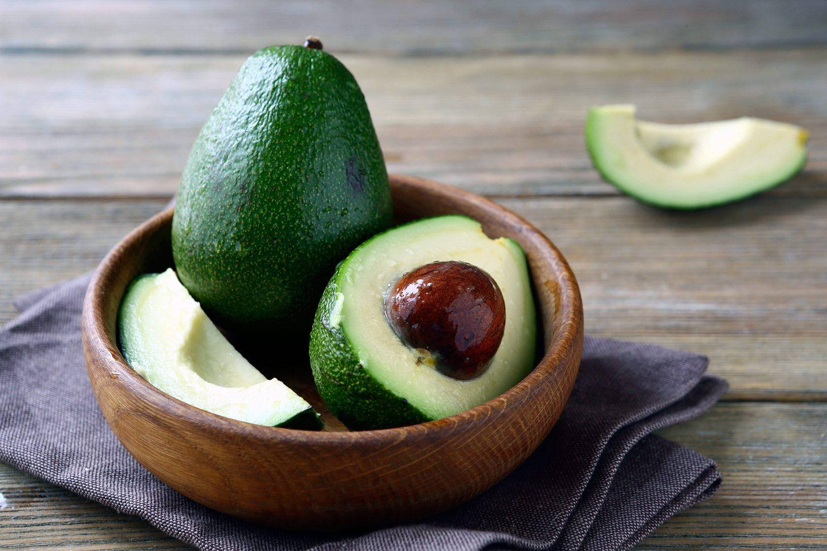 Fresh Avocado Fruit On Wooden Plate Picture