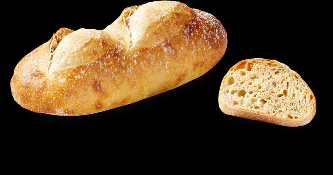 Fresh Baked Baguetteand Sliceon Black Background PNG