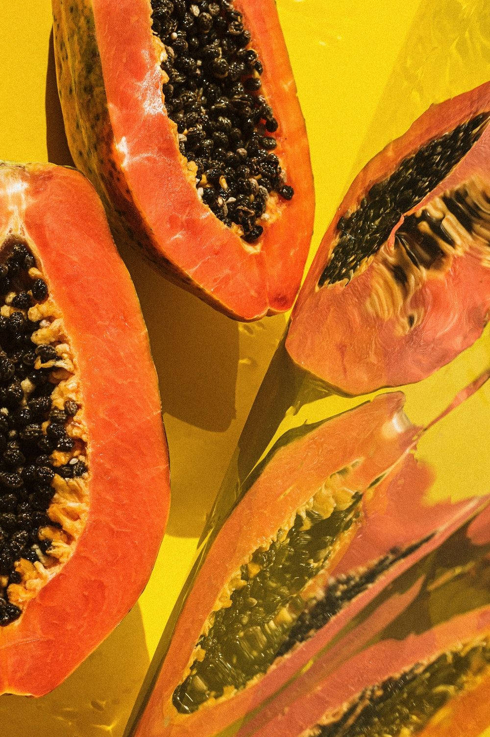 Fresh Papaya Fruits Vibrant Yellow Wallpaper