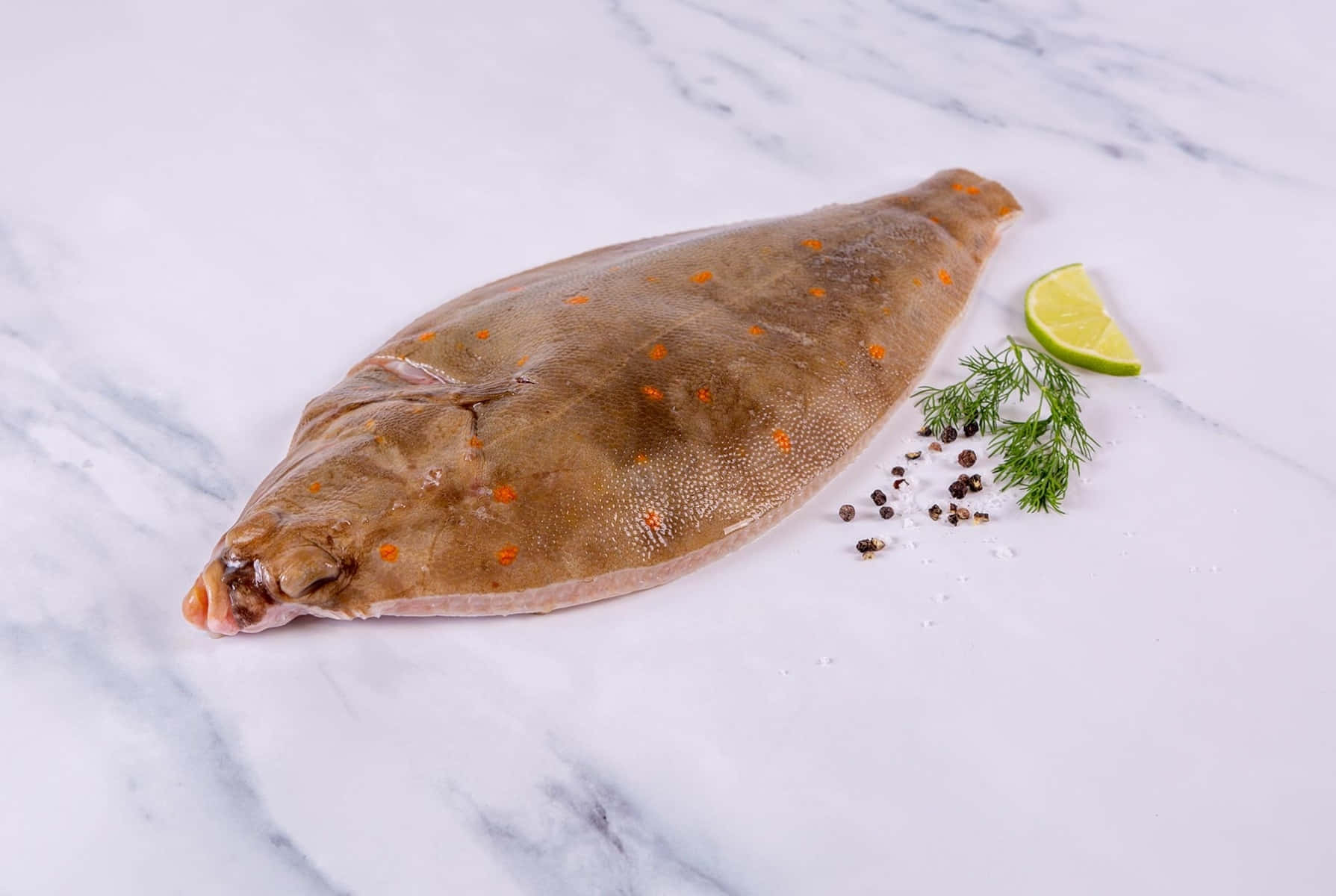 Fresh Plaice Fish With Herbs And Lime On Marble Wallpaper