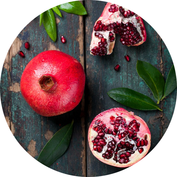 Fresh Pomegranateand Seedson Wooden Background PNG