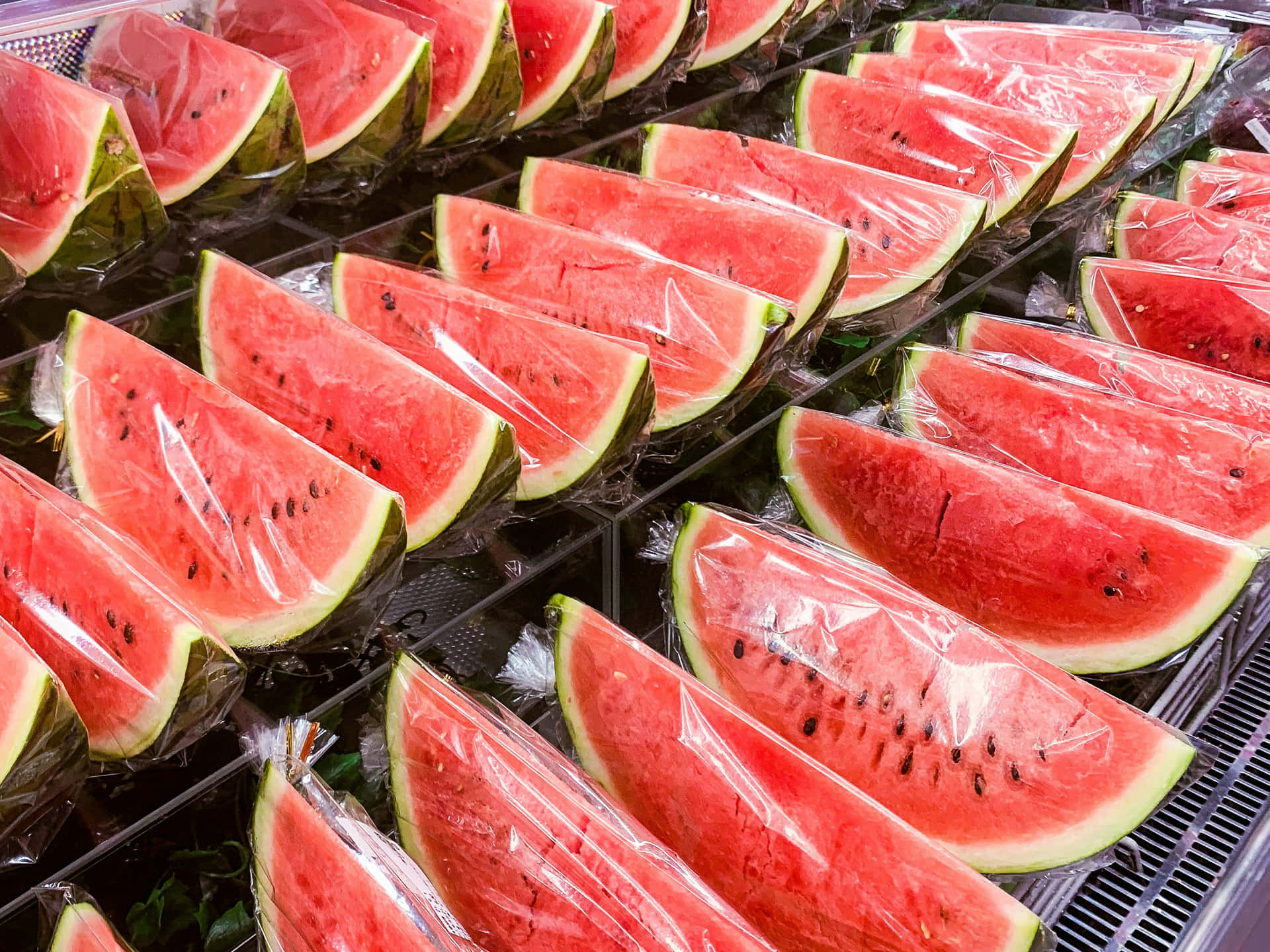 Fresh Watermelon Slices Packaged Display Wallpaper