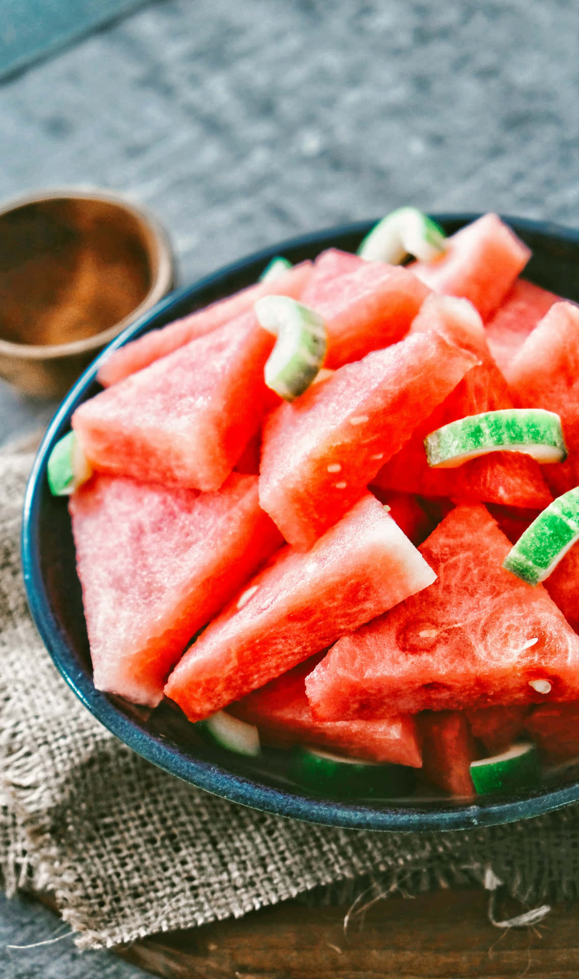 Fresh Watermelon Slicesin Bowl Wallpaper