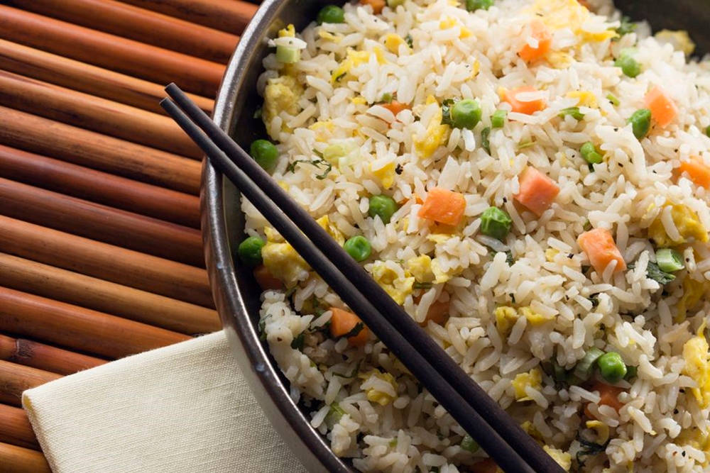 Fried Rice With A Pair Of Chopsticks Wallpaper