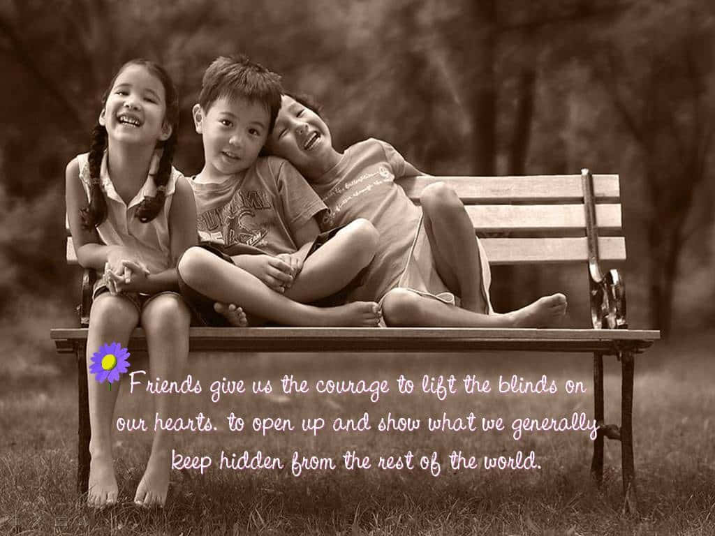 Three Children Sitting On A Bench With A Quote