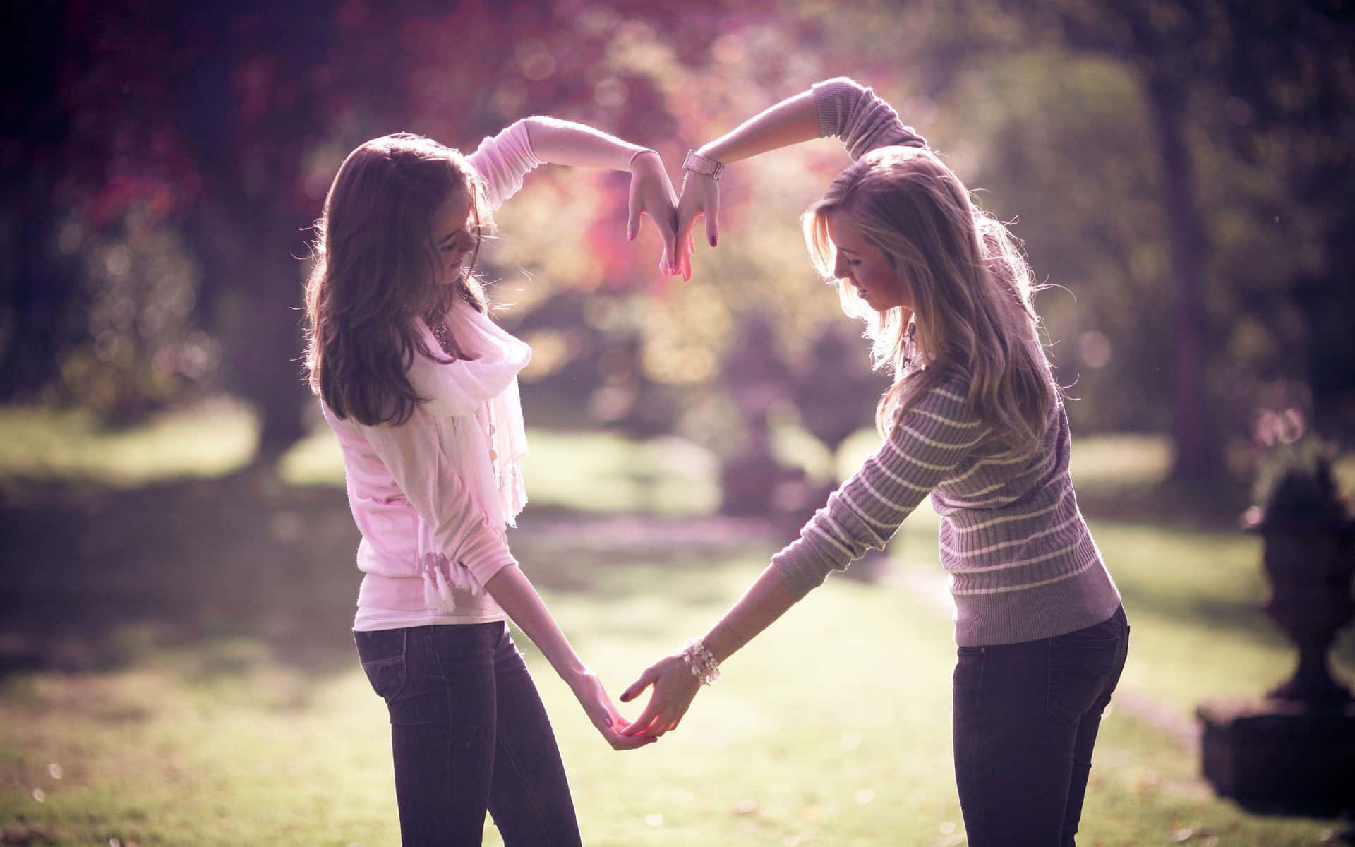 Friendship Girls Forming Heart In Forest Picture