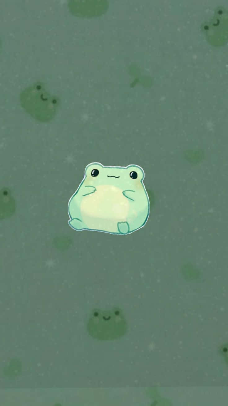 A green frog in the grass