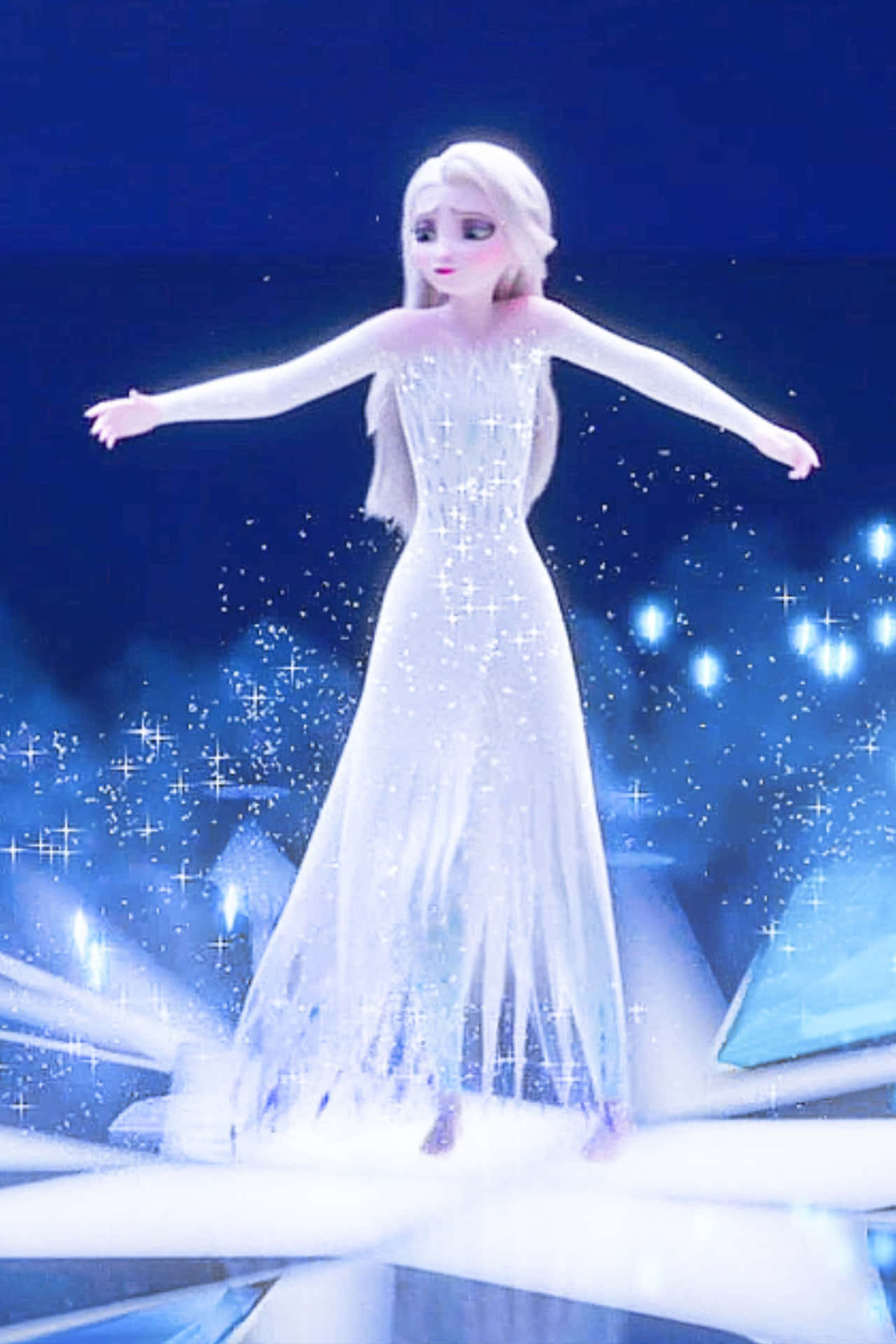 Get ready to experience the magic of 'Frozen 2' with Elsa in her beautiful white dress. Wallpaper