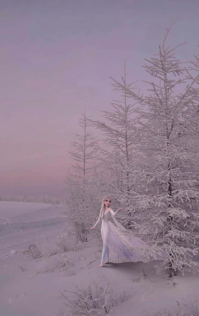 A Woman In A White Dress Is Standing In The Snow Wallpaper