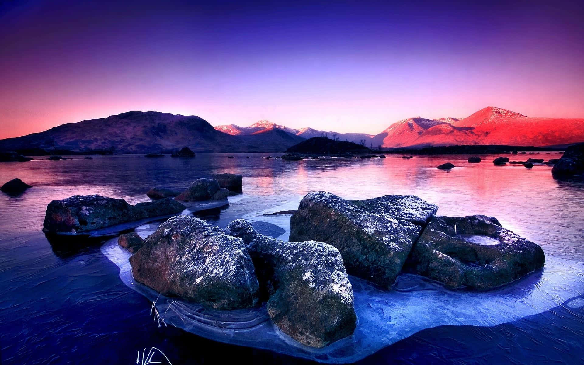 Peaceful Reflections on a Frozen Lake Wallpaper