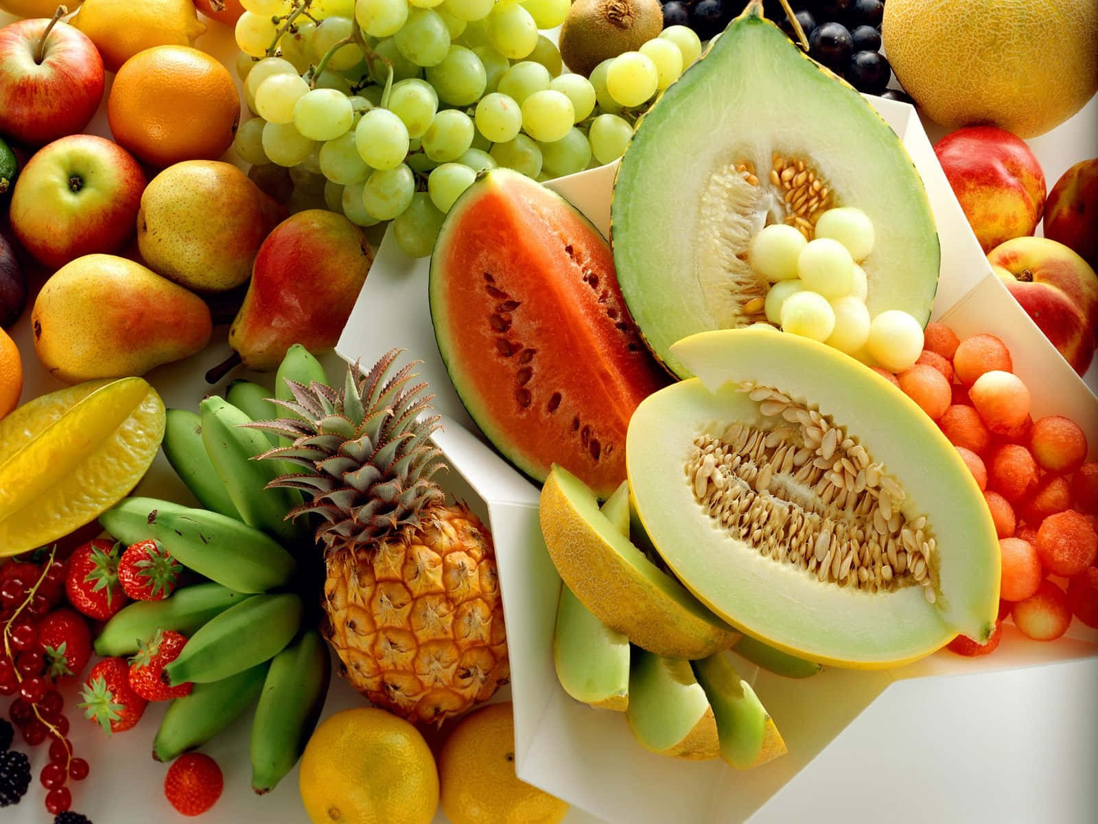 Healthy Fruits On A Table Background