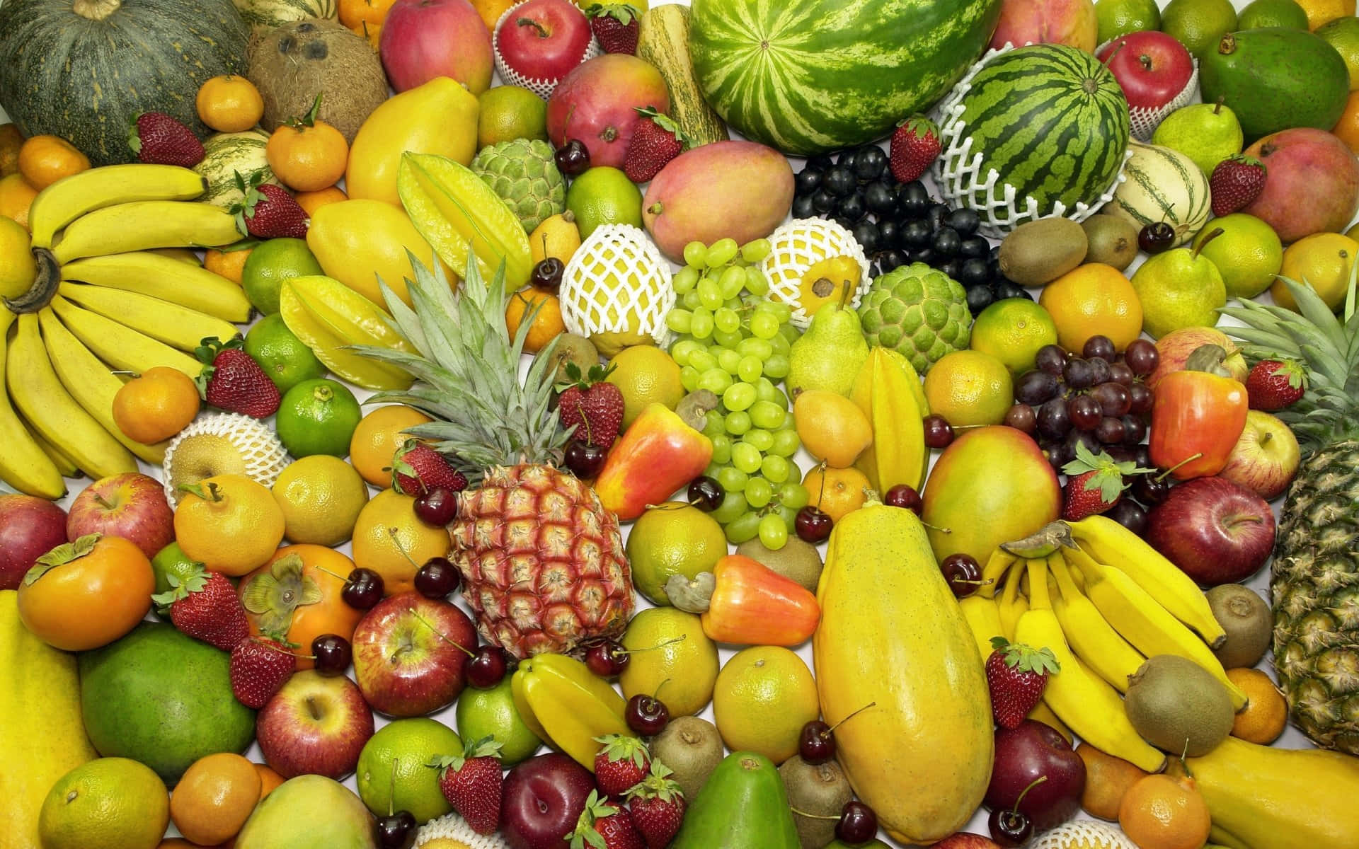 Fresh Fruits In A Bunch Background