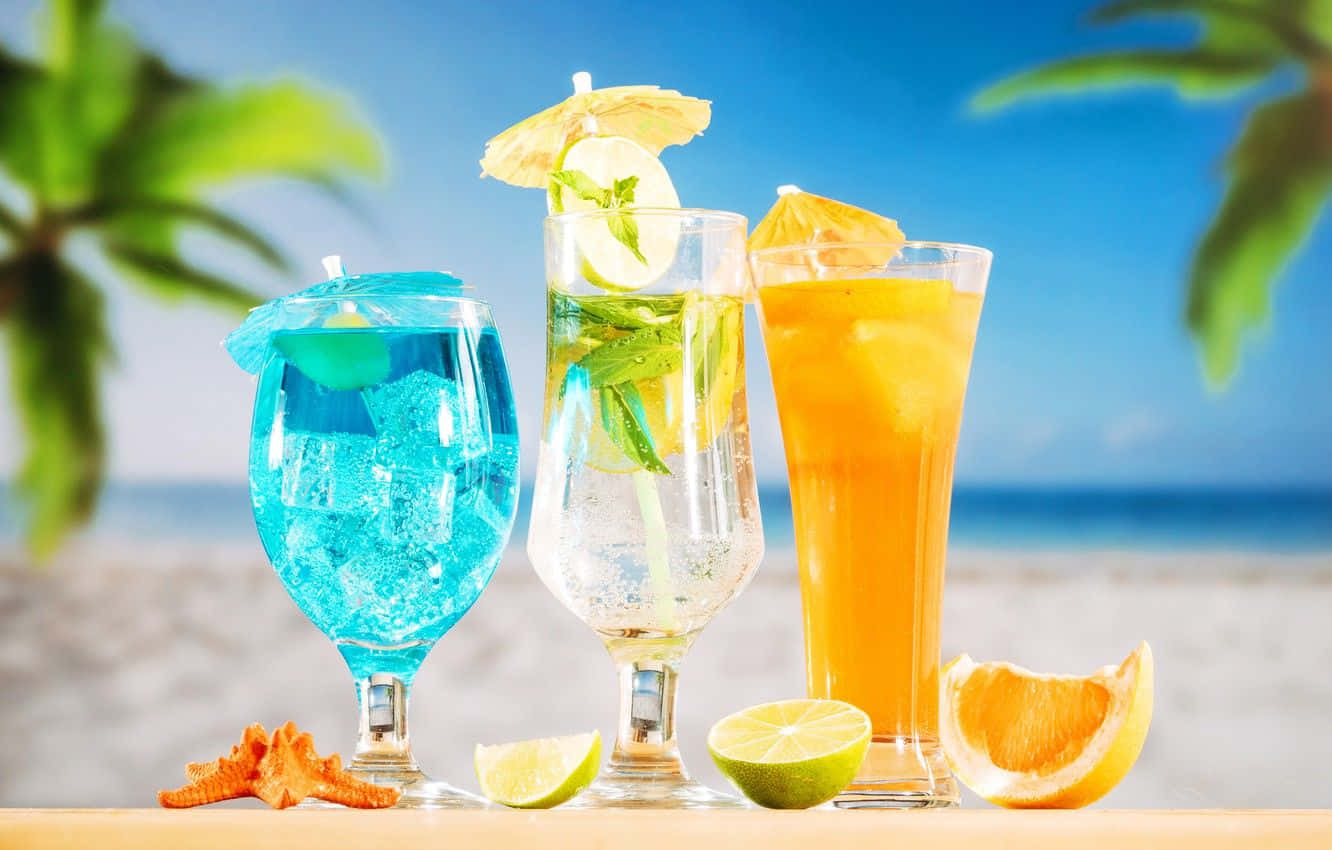 Fruit Cocktail Drinks On Beach Wallpaper