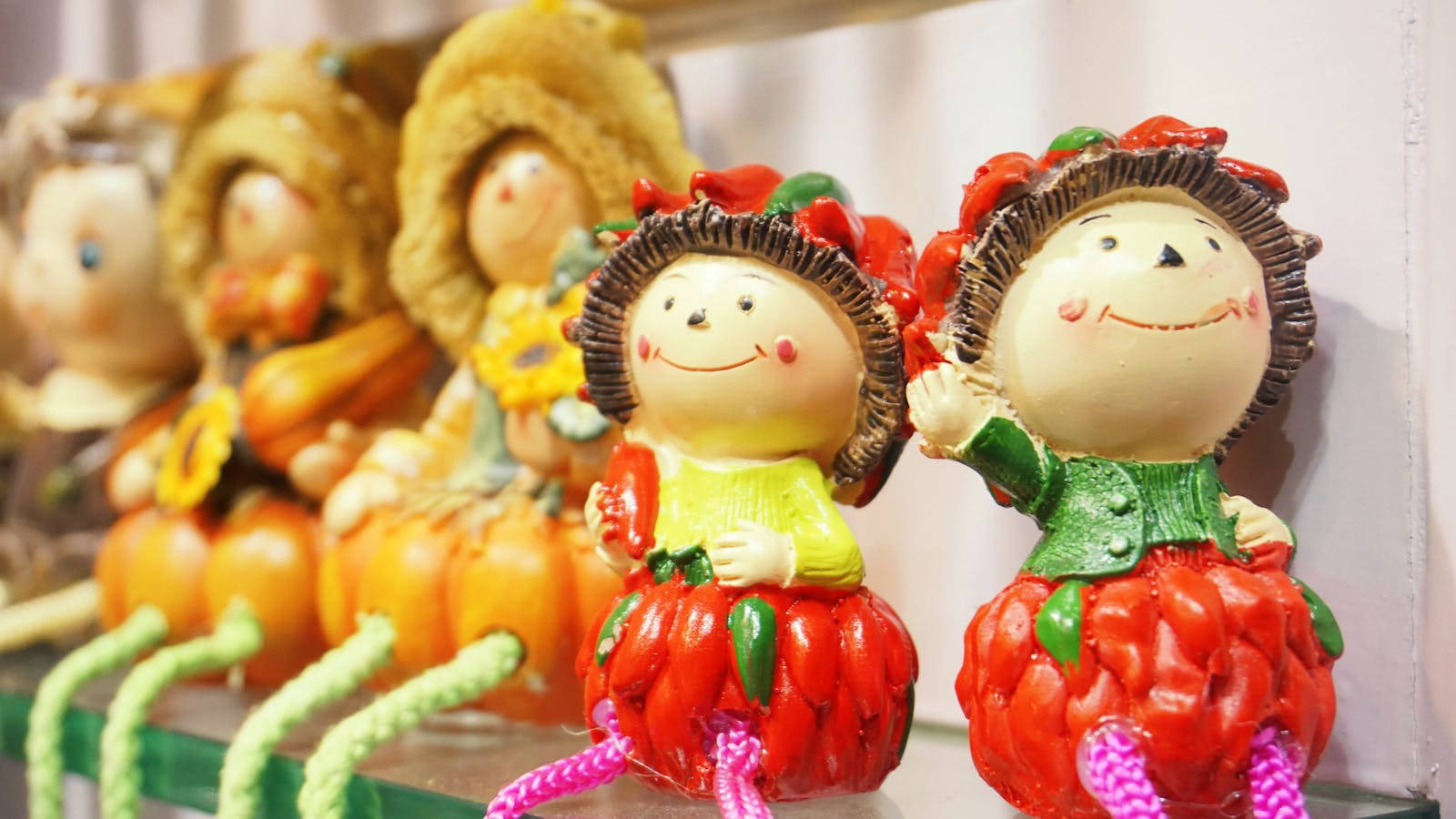 Muñecasadorables Con Temática De Frutas Sonrientes. Fondo de pantalla