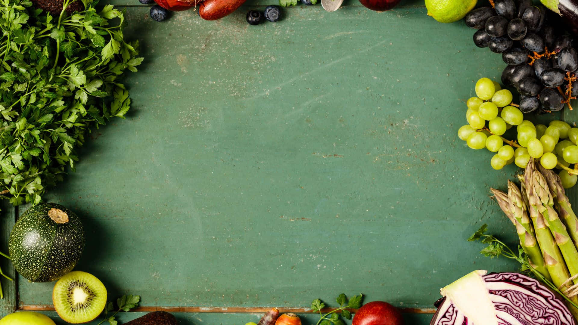A Green Background With Various Fruits And Vegetables
