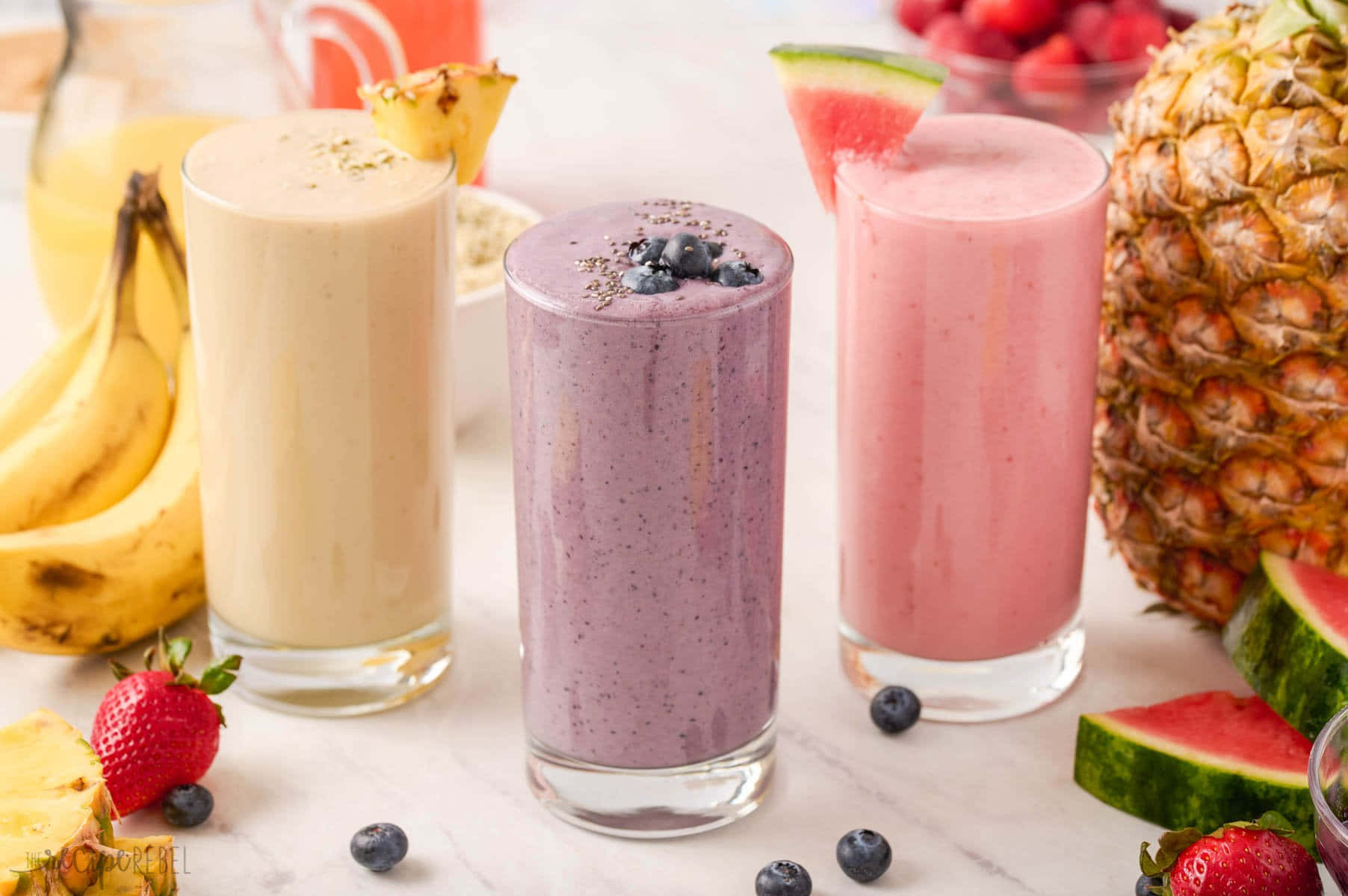 A Variety Of Smoothies With Fruit And Fruit