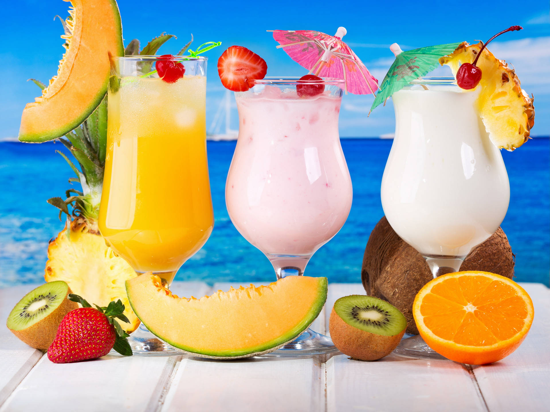 Fruity Glasses Of Tropical Drinks Wallpaper