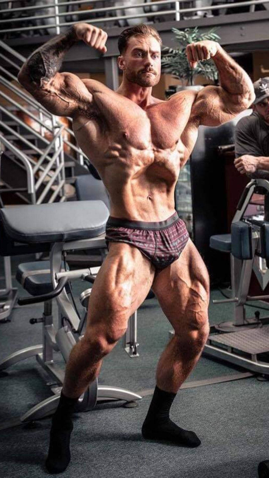 Full Body Photo Of Chris Bumstead Wallpaper