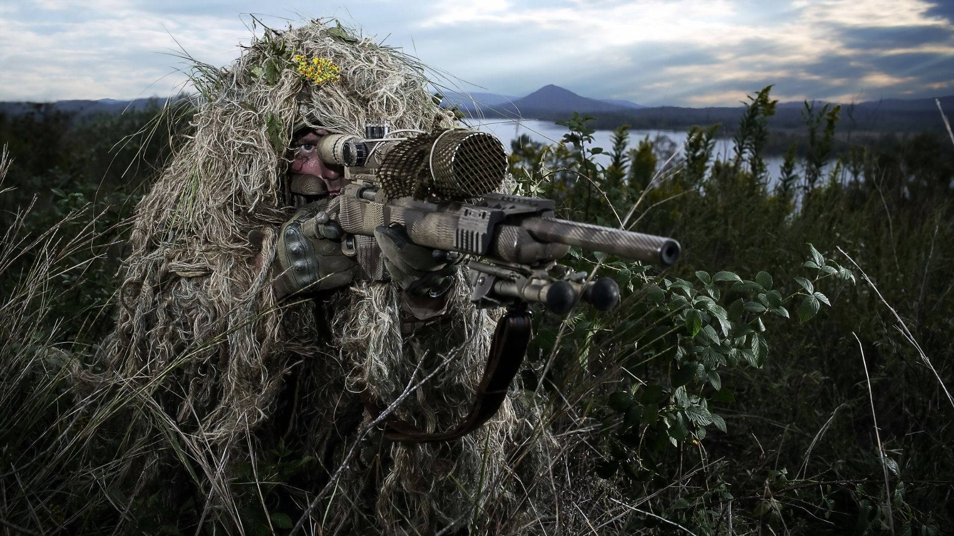 Full Camo Soldier Holding A Sniper Wallpaper