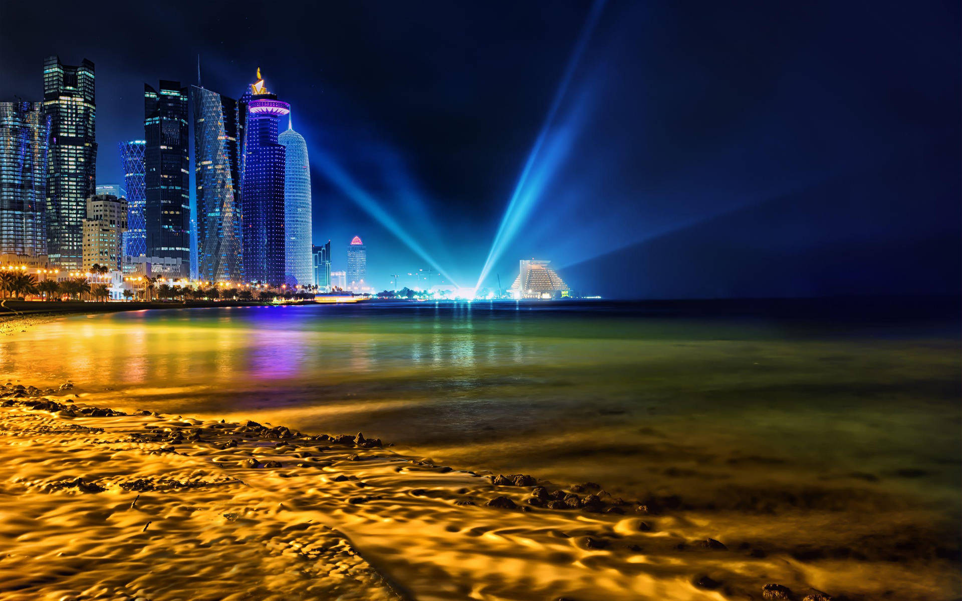 Full Doha City Beach Night Wallpaper