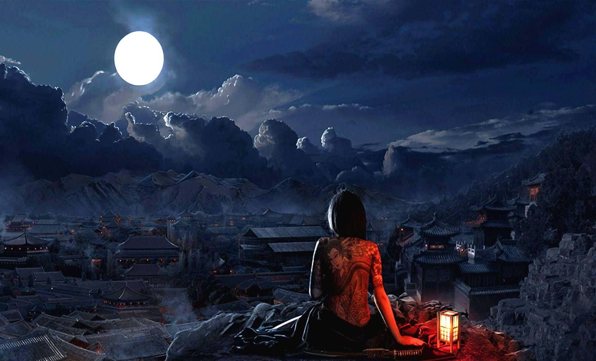 Einefrau Sitzt Auf Einem Felsen Und Schaut Auf Den Mond.