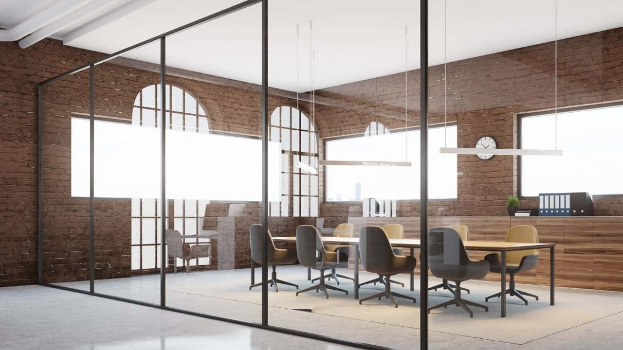 A Conference Room With Glass Walls And Chairs