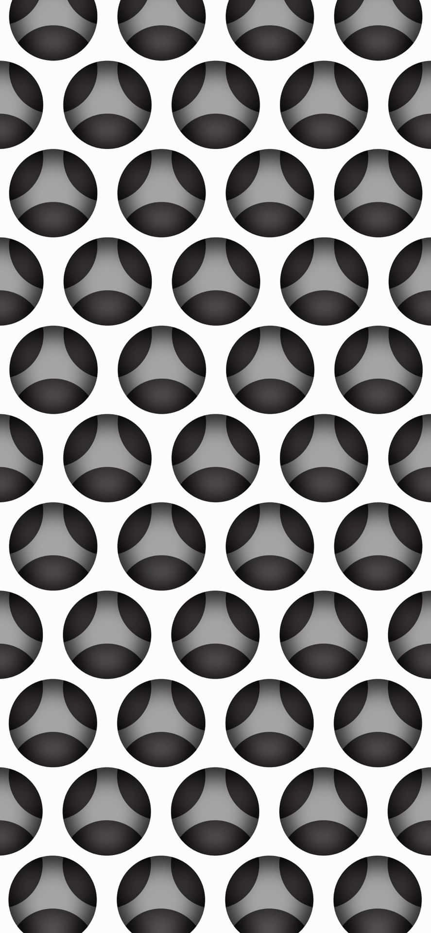 A Black And White Pattern With A Lot Of Circles Wallpaper