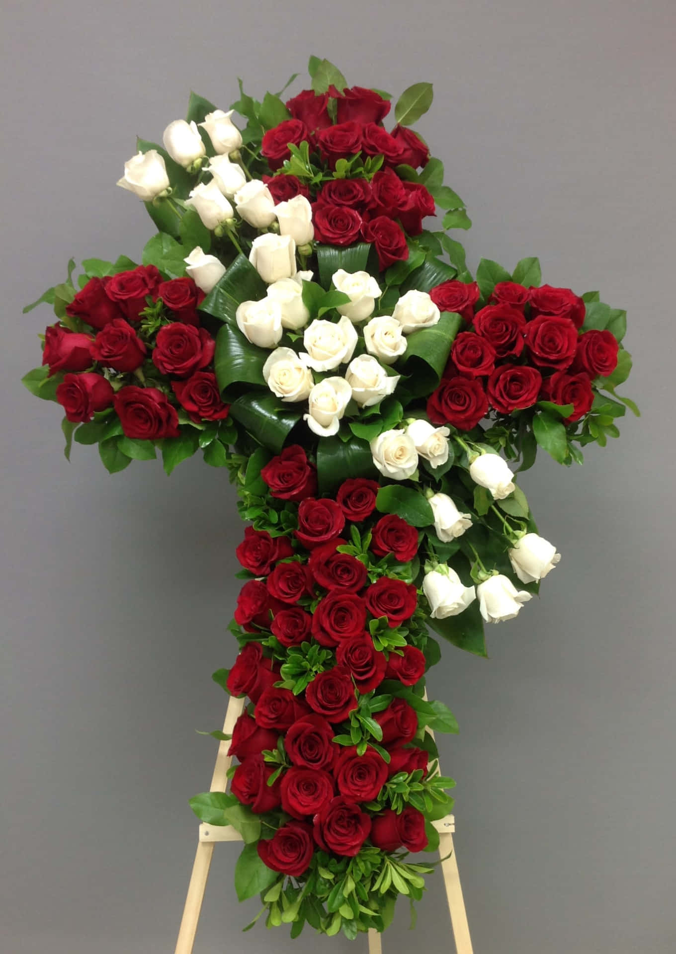 A beautiful, somber funeral flower arrangement
