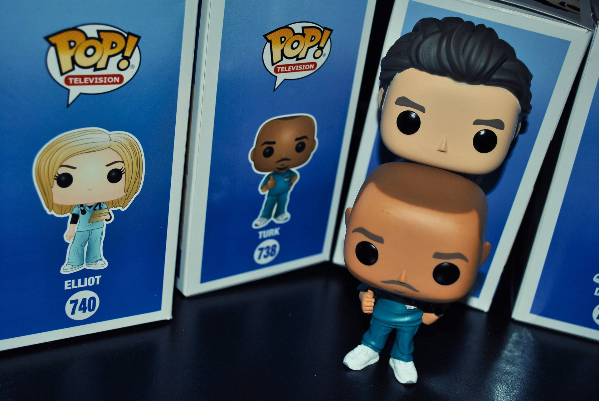 Caption: Funko Pop's JD and Turk Figurines Inspired by Scrubs TV Show Wallpaper