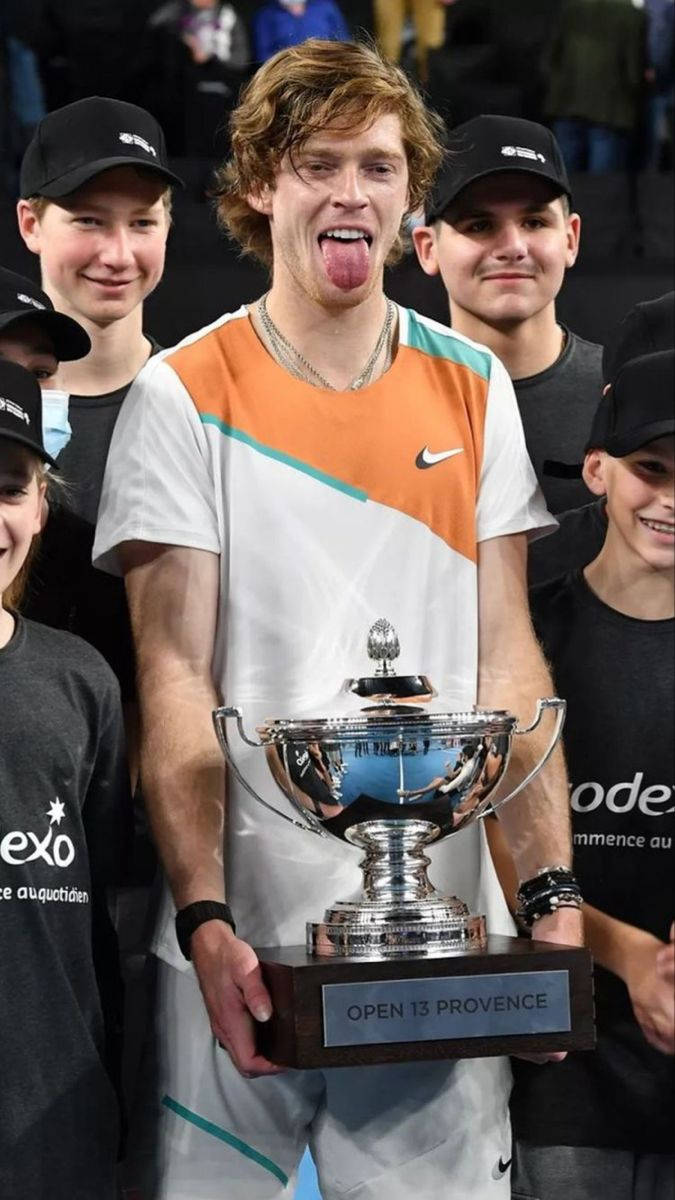 Funny Andrey Rublev With Trophy Wallpaper