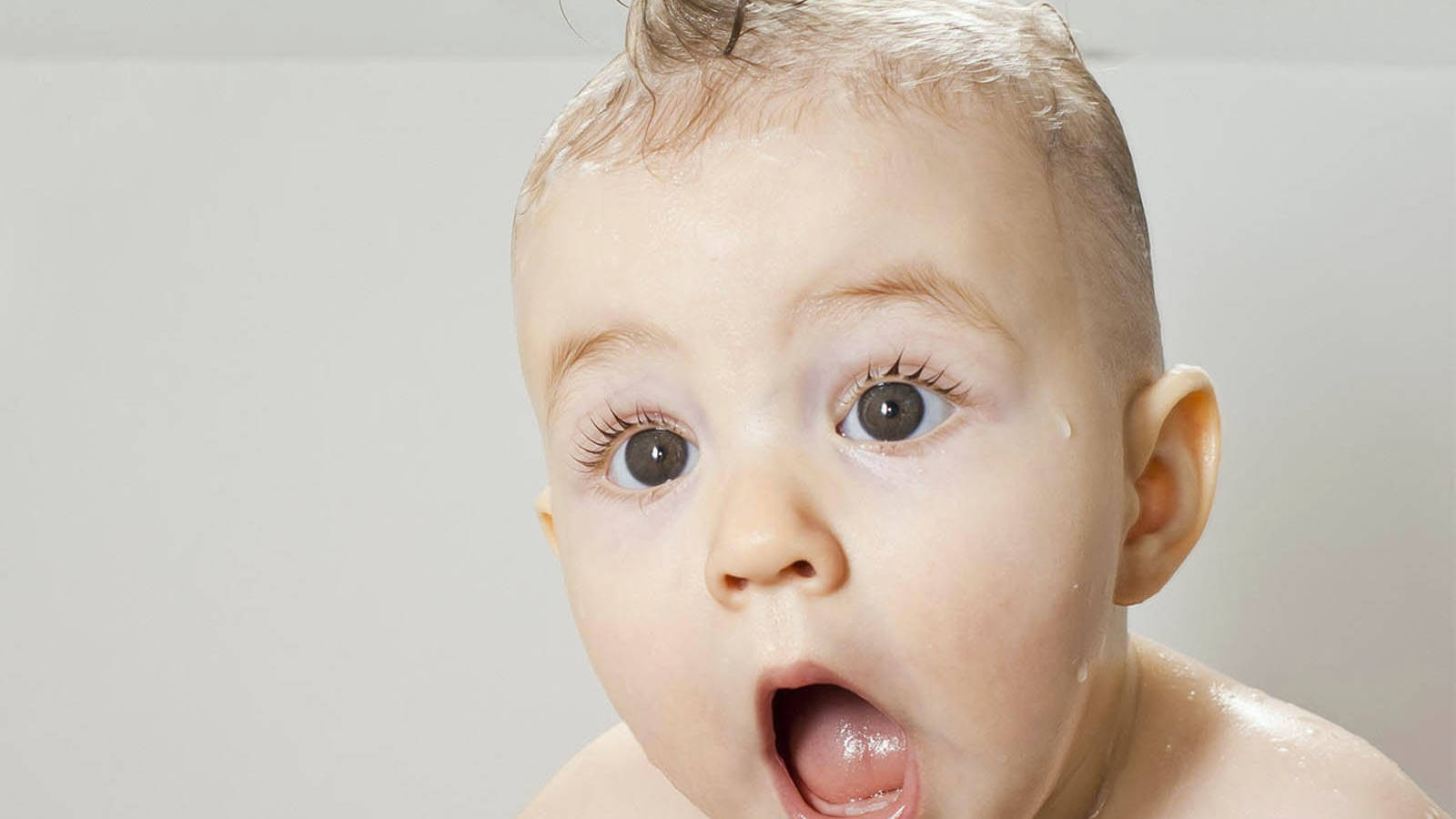 Funny Baby Shocked Face Wallpaper