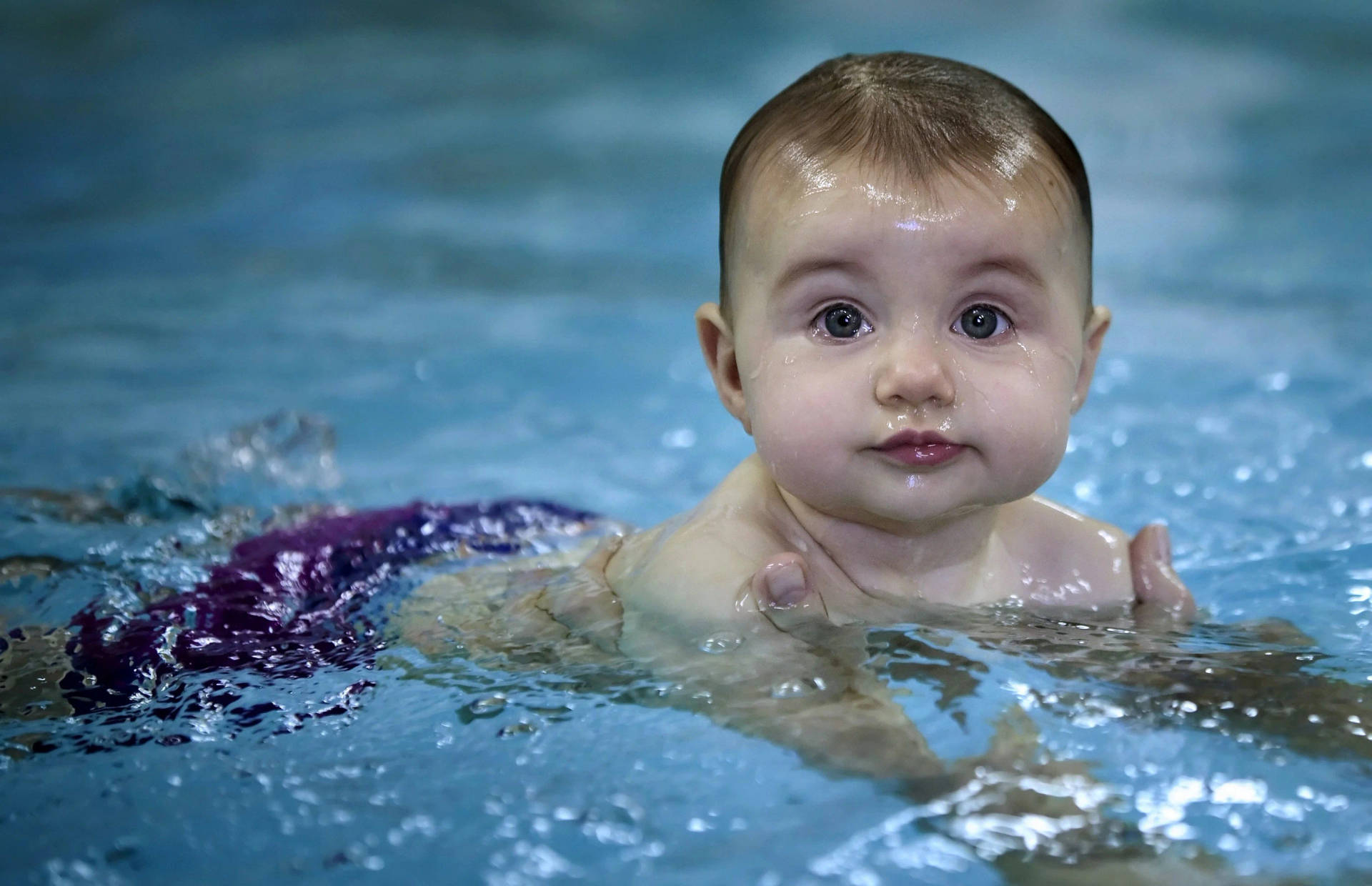 Funny Baby Swimming Wallpaper