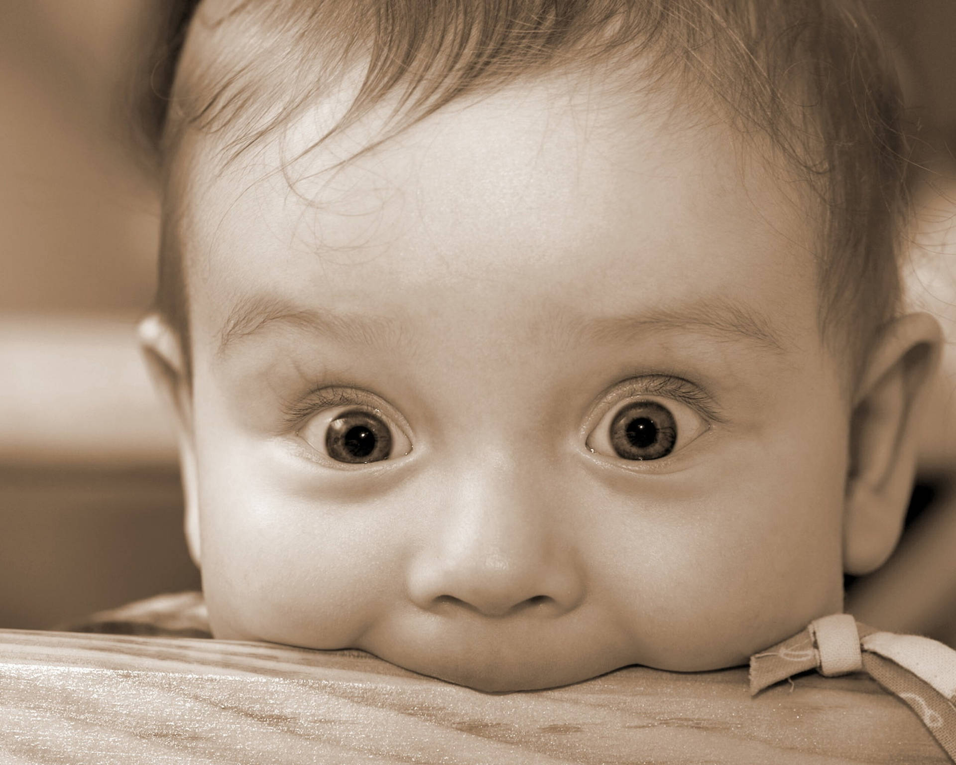 Funny Baby With Beautiful Eyes Wallpaper