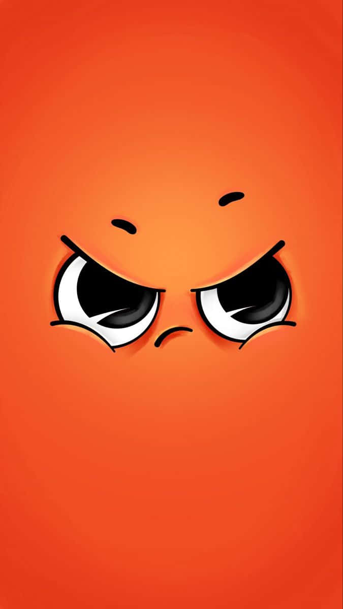 An Orange Face With Angry Eyes Wallpaper