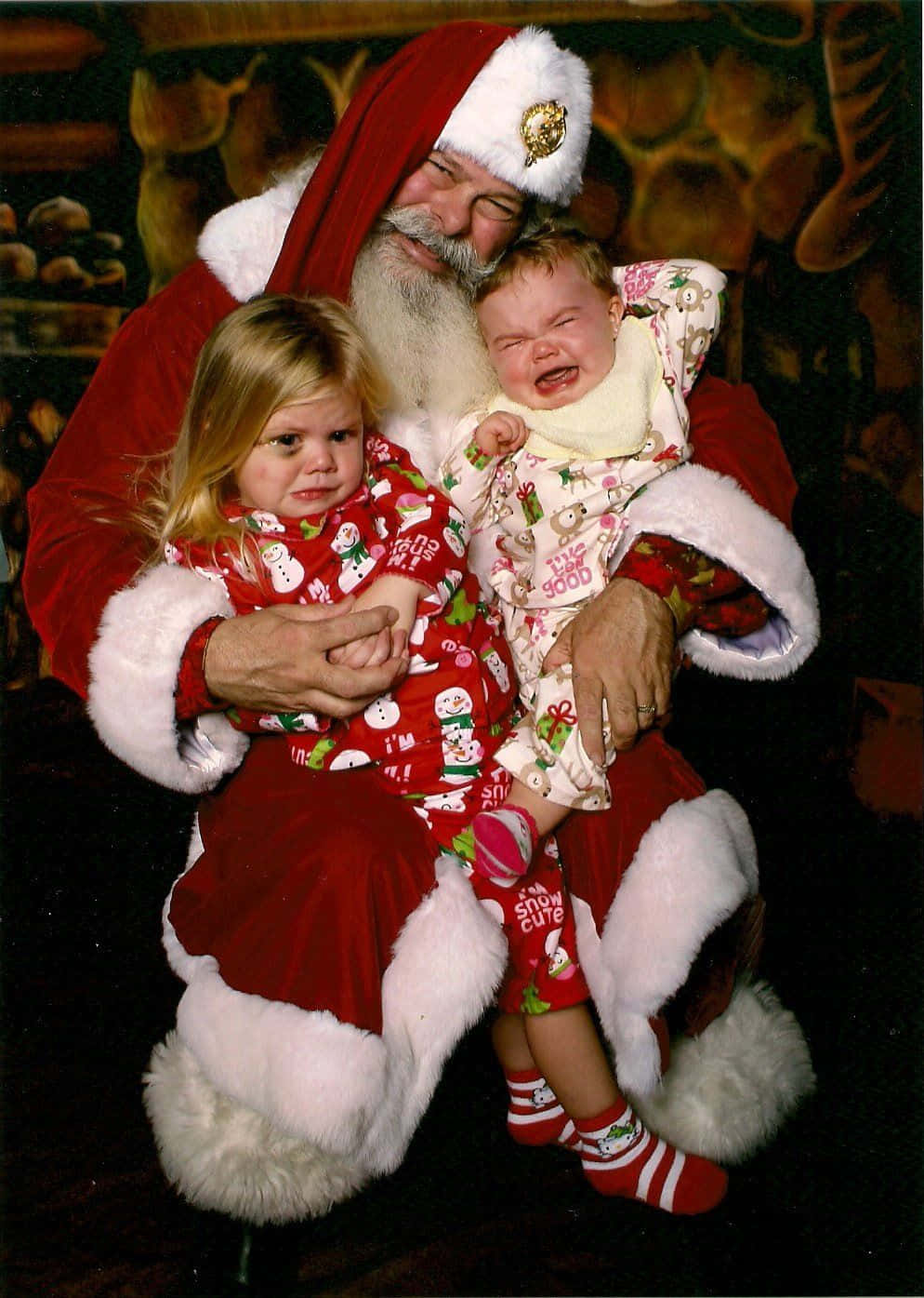 Funny Santa With Two Crying Kids Picture