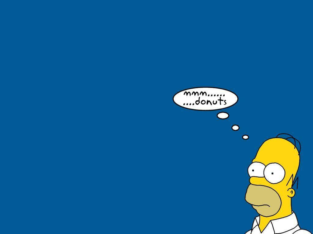 Roligahomer Simpsons Tänker På Munkar (som Bakverk Eller Maträtt) På Datorskärmen Eller Mobilskärmen. Wallpaper