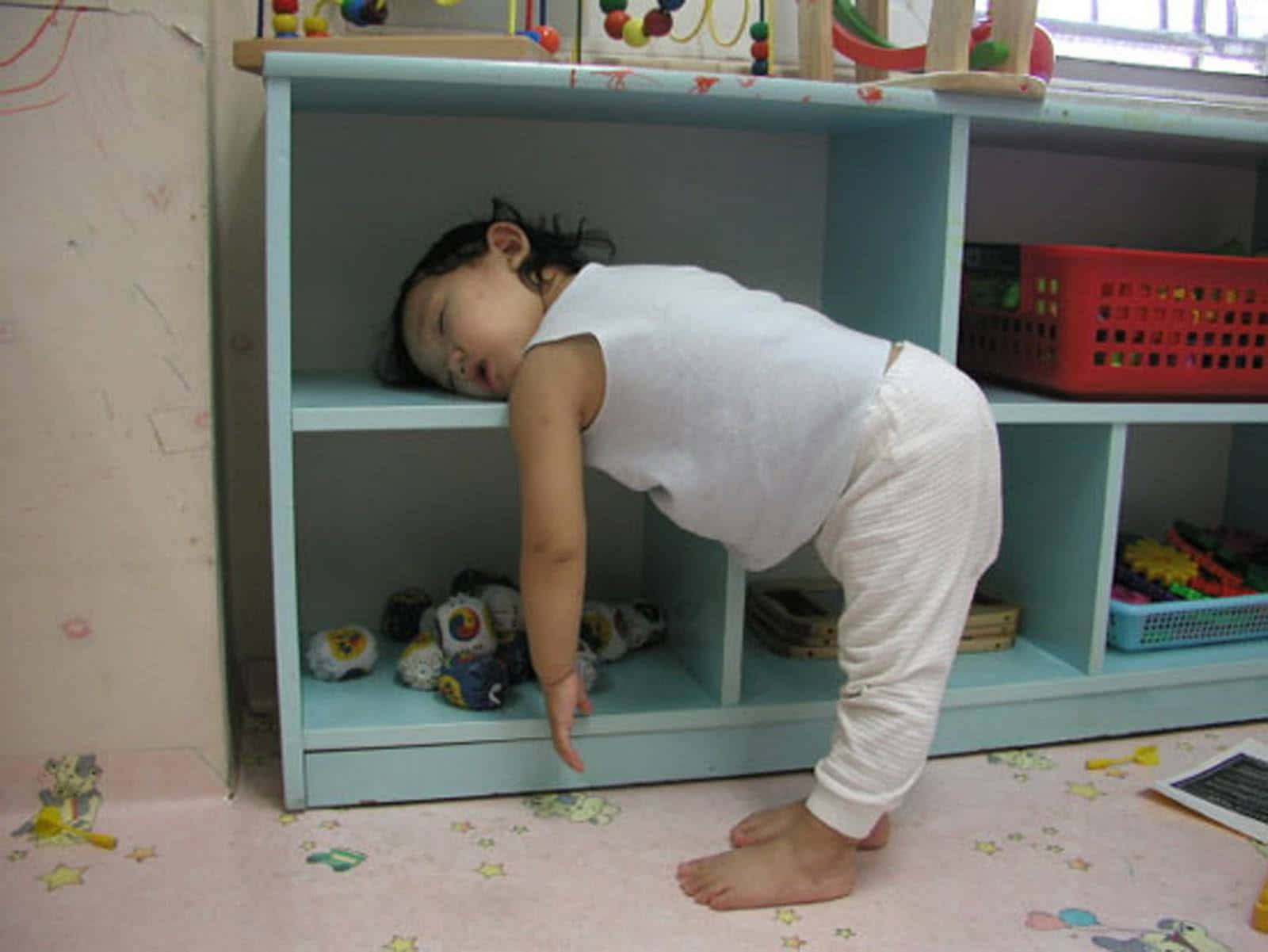 Funny Sleeping Baby On Shelf Picture