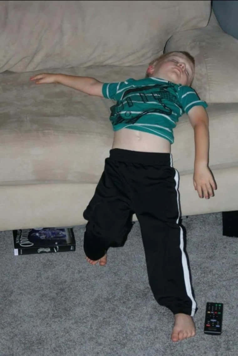 Imagendivertida De Un Niño Durmiendo