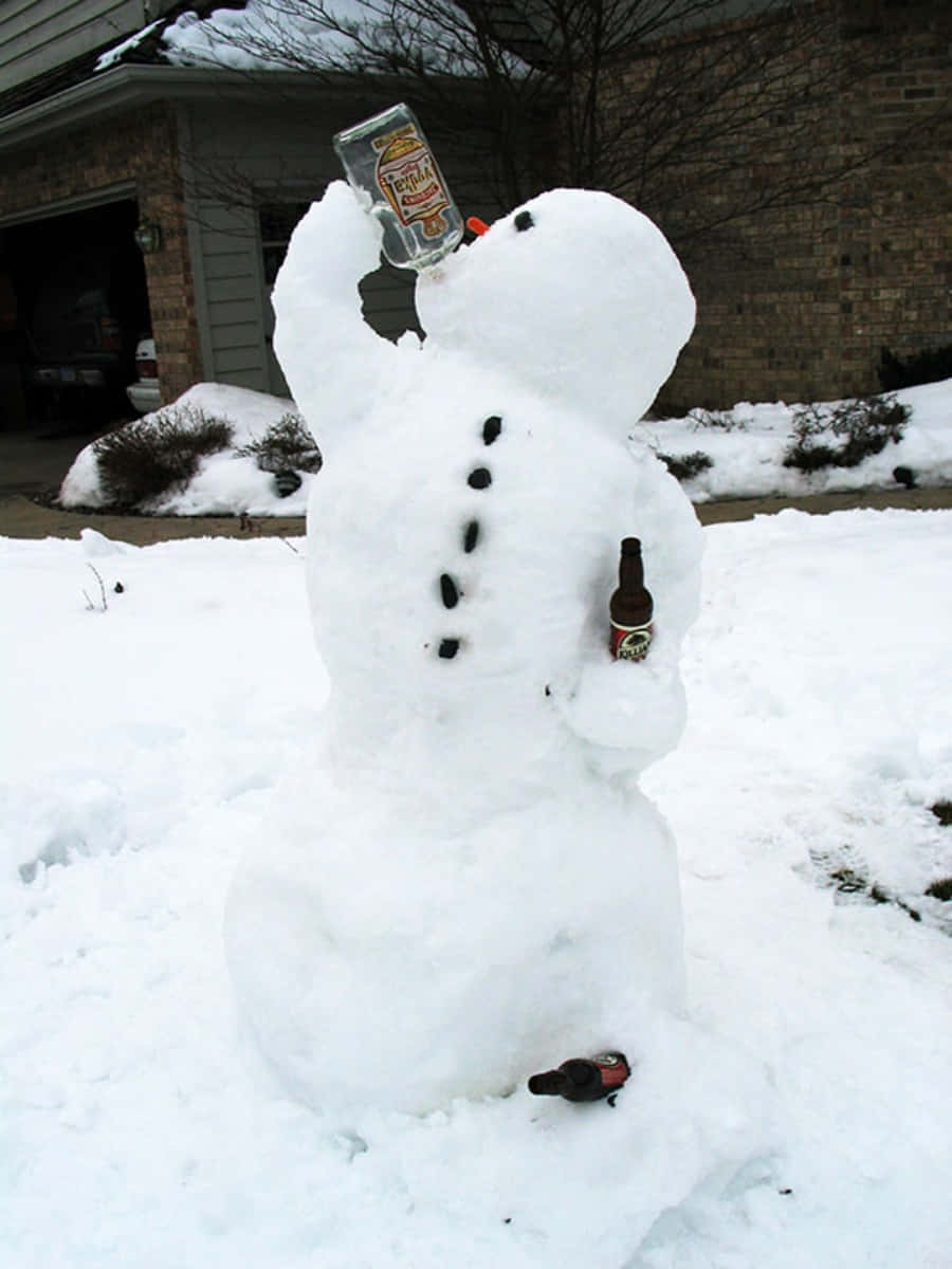 Imagendivertida De Un Muñeco De Nieve Bebiendo Cerveza