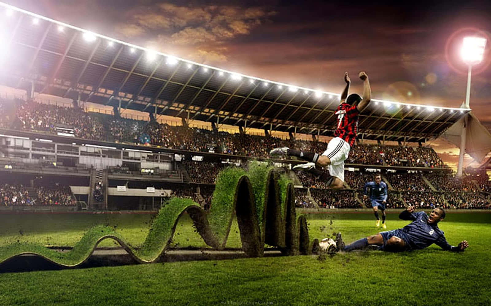 Engraçadojogador De Futebol De Esportes Raspando A Grama No Campo Imagem.