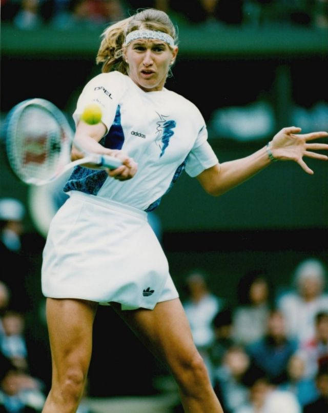 Humorous Moment with Steffi Graf Wallpaper