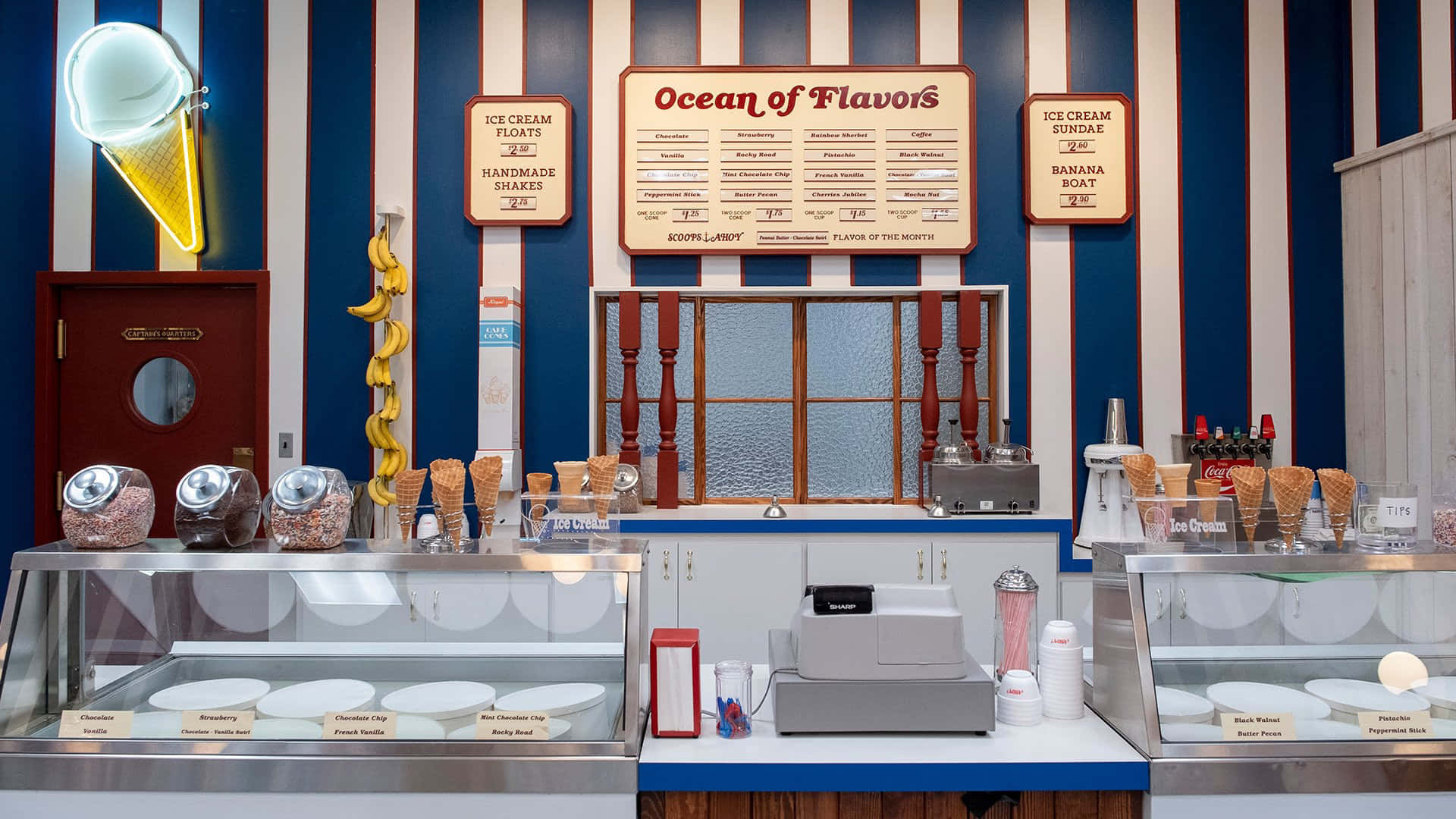 A Counter With A Variety Of Ice Creams And Toppings